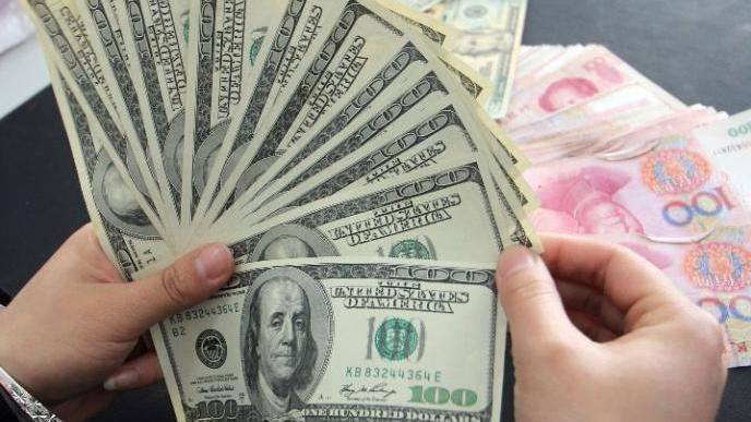 在岸人民币兑美元收盘报7.1248 上涨73点