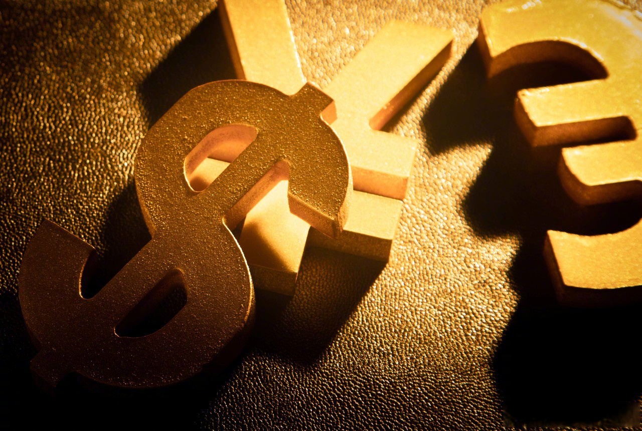 人民币兑美元中间价报7.1034 调升28点